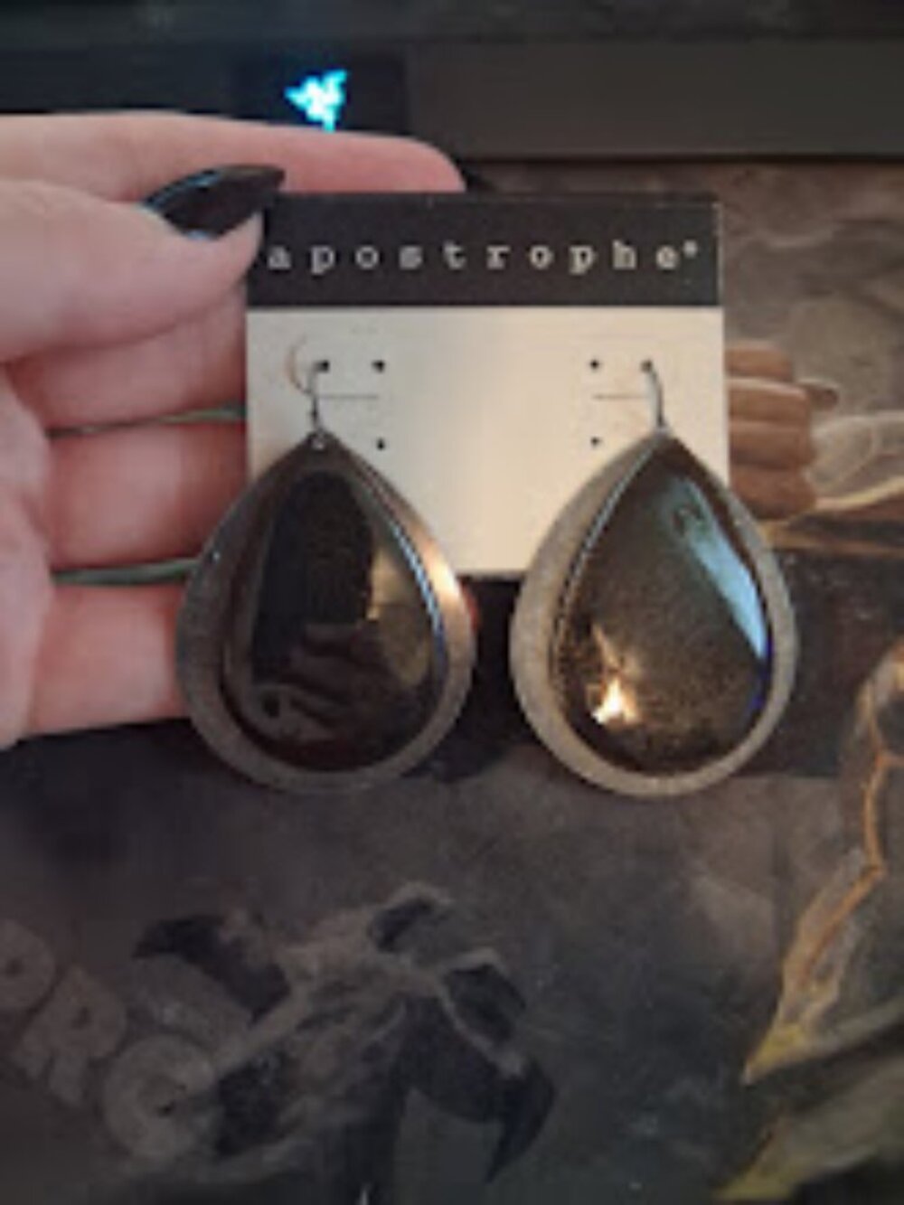 Apostrophe dangle earrings